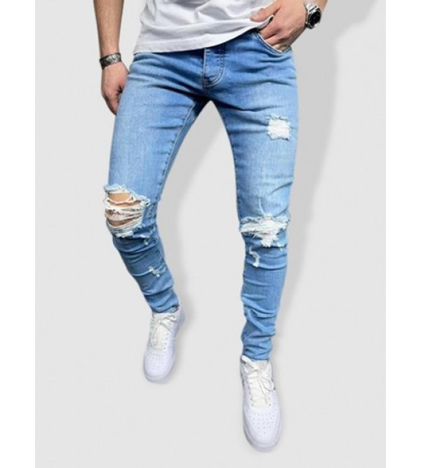Distressed Frayed Slim Fit Tapered Jeans