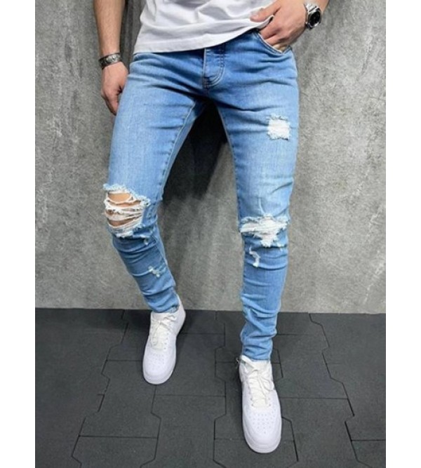 Distressed Frayed Slim Fit Tapered Jeans